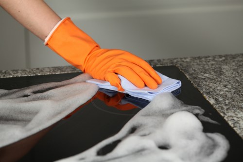 Twickenham office cleaners vacuuming carpets in a commercial setting