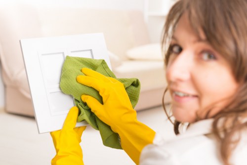 Service terms document and cleaning equipment representing cancellation and liability terms